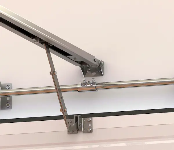 Sistema de desbloqueo manual en motor para puerta de garaje seccional